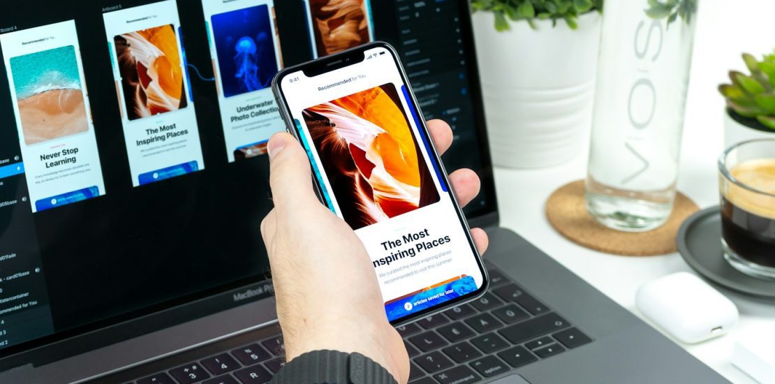 Person using a smartphone camera for visual search